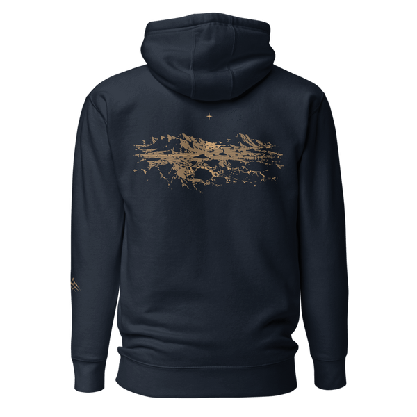 Digital mockup of Mare navy hoodie back with muted-gold lunar landscape and one star.