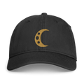 Digital front mockup of the Umbra Hat on a black washed cotton cap, with an Old Gold crescent and three crater openings.