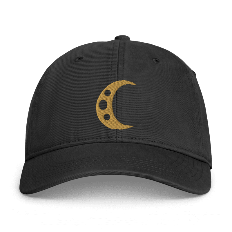 Supplier-generated front mockup of the Umbra Hat on a black Comfort Colors CCWC0 cap, with an Old Gold crescent and three crater openings.