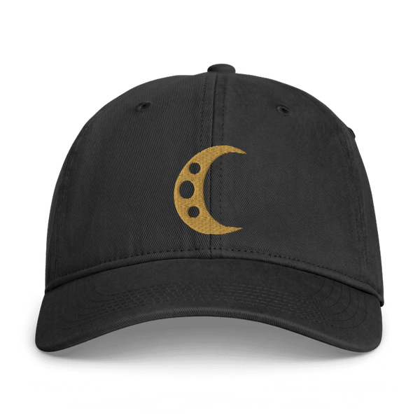 Digital front mockup of the Umbra Hat on a black washed cotton cap, with an Old Gold crescent and three crater openings.